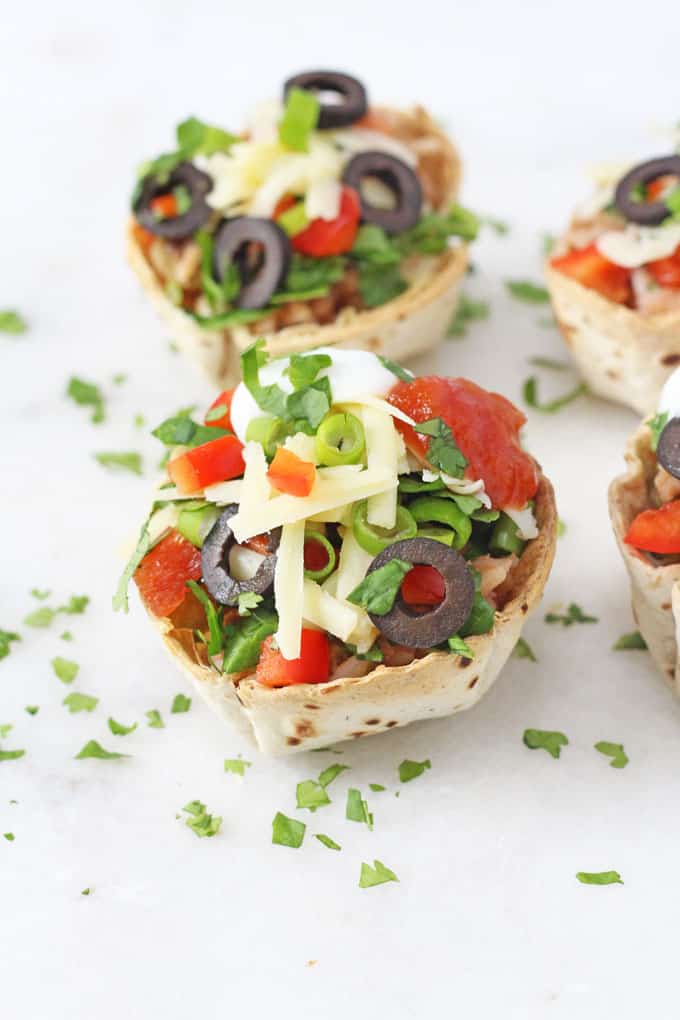 Use up leftover chilli and make these quick and easy Taco Cups filled with green and black olives, cheese and red peppers | My Fussy Eater blog