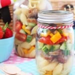 A super simple Italian Sausage Pasta Salad recipe that can be easily stored in a mason jar and taken to picnics or to work and school for lunch!