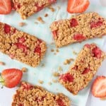 A delicious soft oat bars packed full with sweet strawberries. A tasty and healthy snack for toddlers and older kids!
