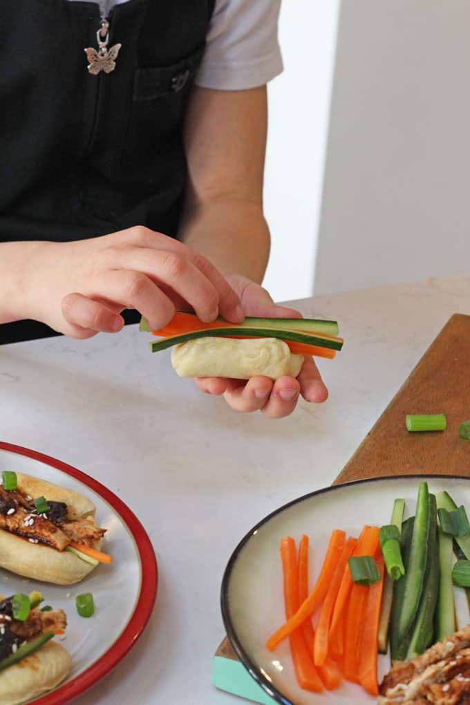 Delicious freshly made steamed buns with a sweet and sticky BBQ chicken sauce made with California Prunes