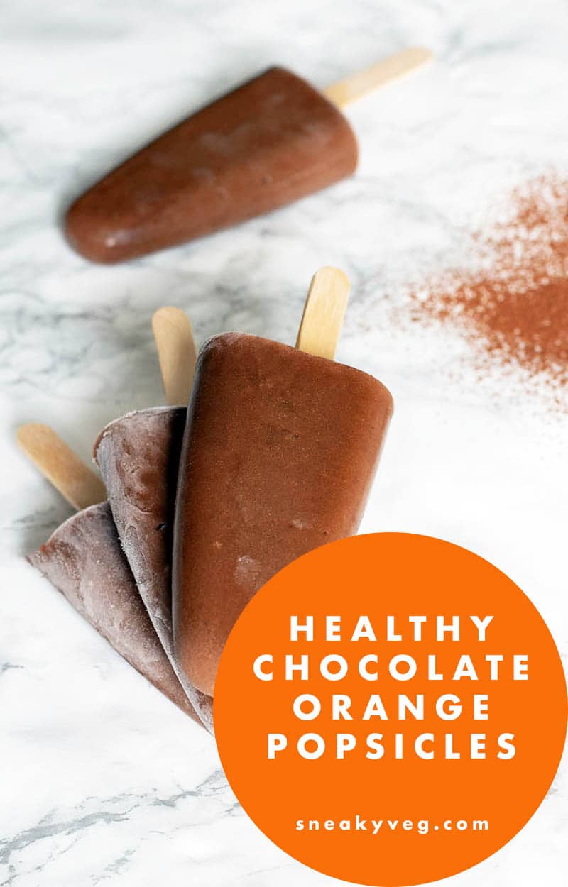 Orange & Chocolate popsicles arranged on a grey and white marble worktop