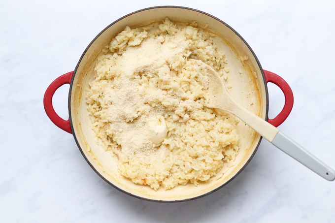 butter and grated parmesan stirred into the cooked risotto rice in the oven proof dish