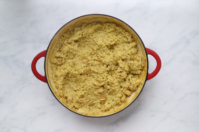 the cooked chicken curry before the spinach has been added.