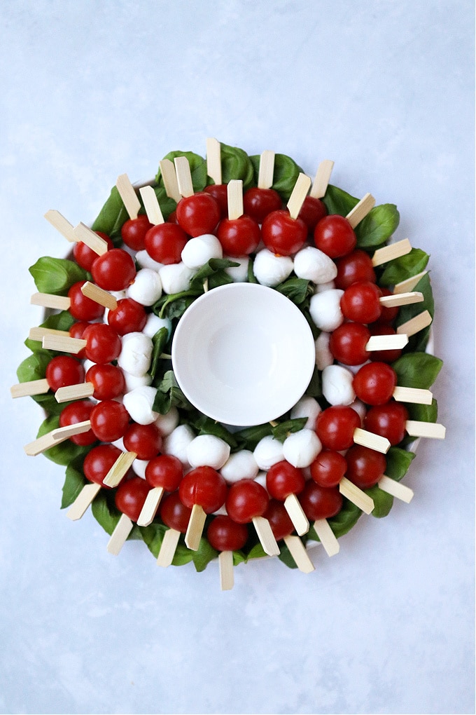 the finished caprese wreath before the glaze has been added to the bowl in the middle
