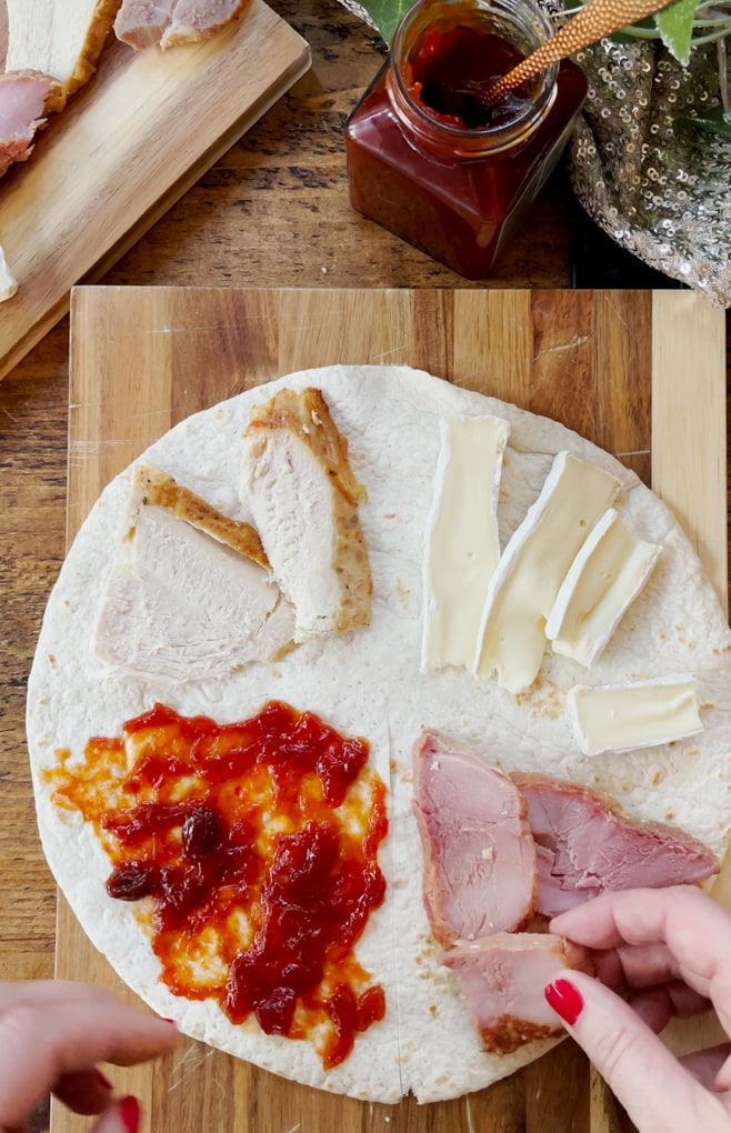 Ingredients being added to the top of the wrap.