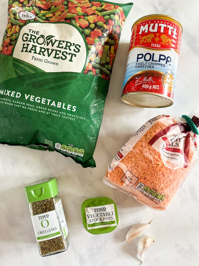 Ingredients laid out on a white kitchen worktop.