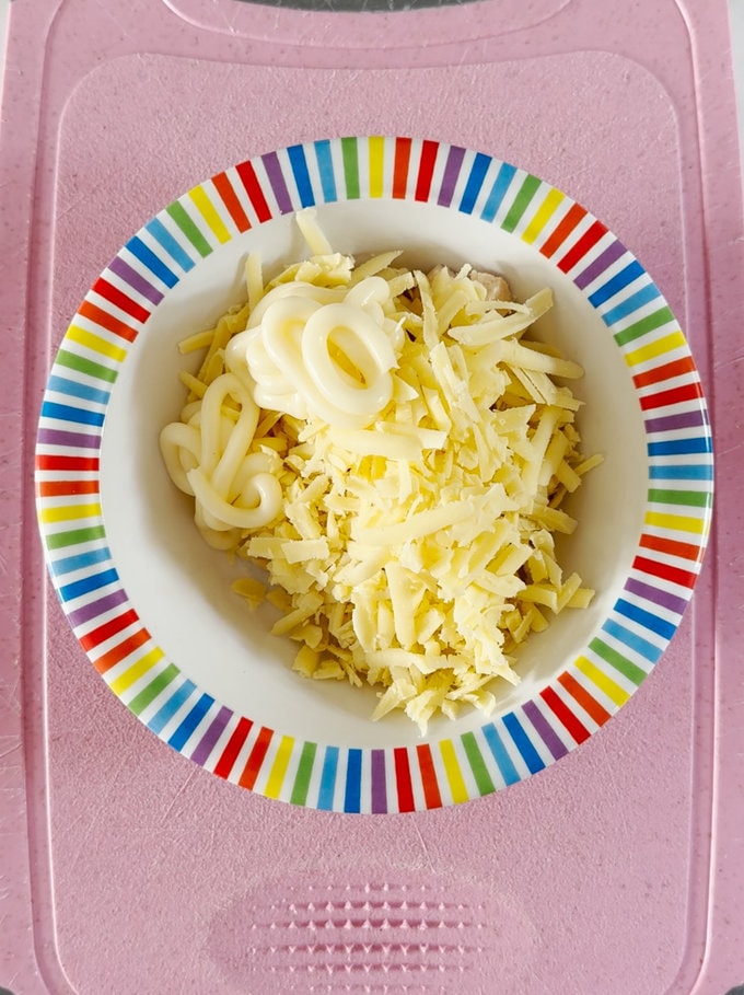 Ingredients all in a colorful bowl ready for mixing.