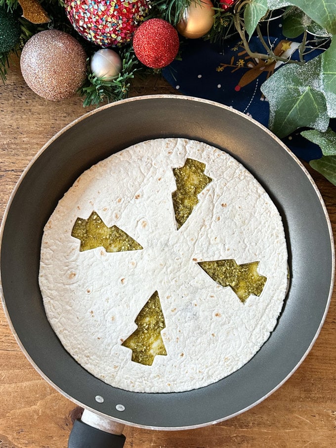 Stuffed tortilla in a frying pan.