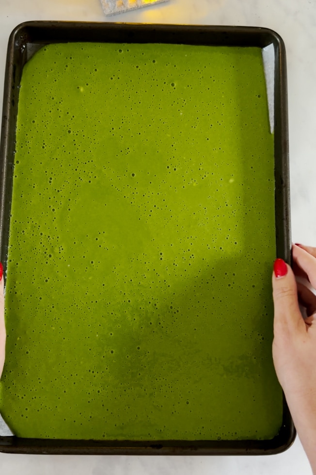 Blended pancake mixture poured into  a oven dish.