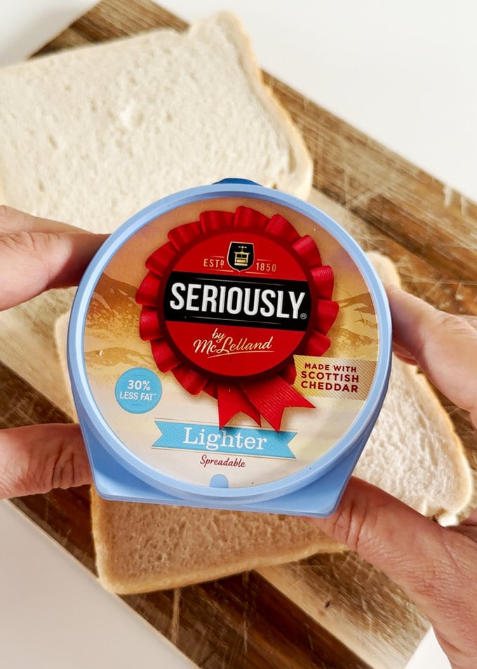 Seriously Strong Lighter Spreadable Cheese in a blue pot