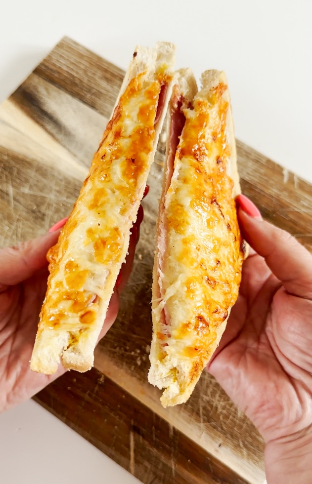 Airfryer Ham & Cheese Toastie Cut into two triangles so you can see the fillings inside the sandwich