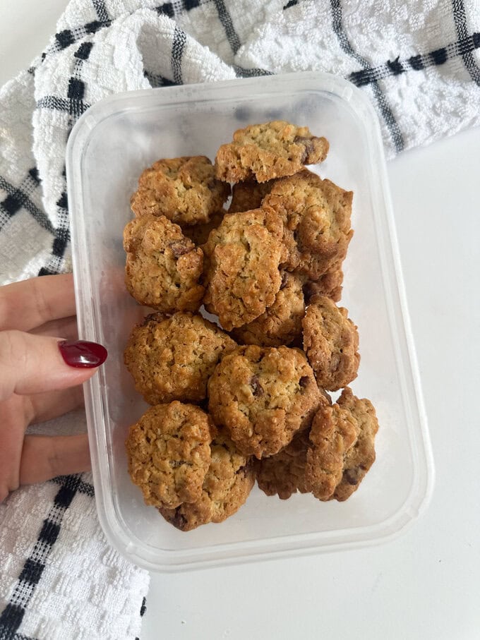 Mini cookies shown in a air tight container showing how to freeze.