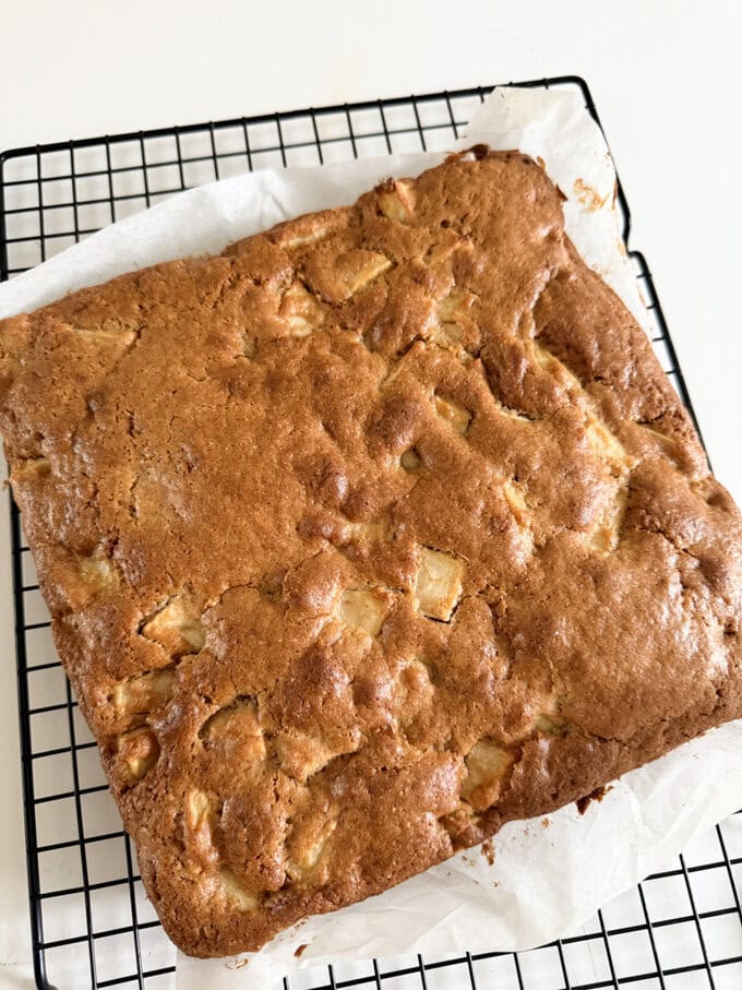 Apple & Cinnamon Cake fresh out of the oven,and cooling on a rack.