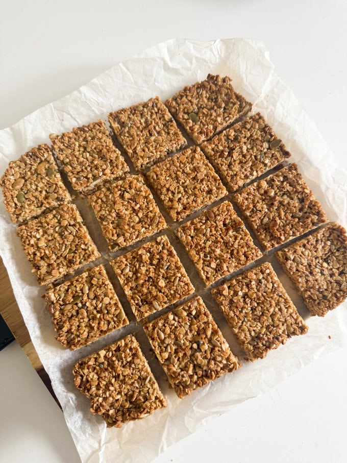 Nut free flapjacks fresh out of the oven and cut into even squares, ready to eat.