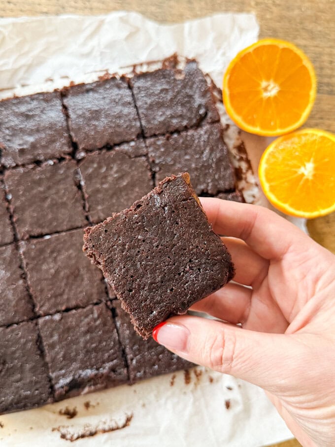 A Close up of Chocolate Orange Black Bean Brownies cut into individual squares.