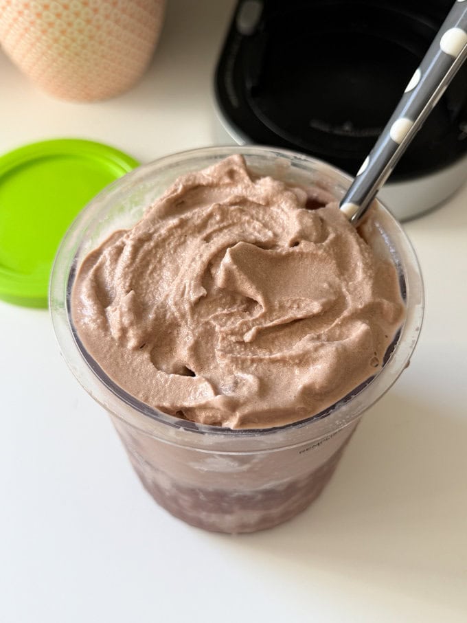 Ninja Creami Chocolate Milkshake just made in the Ninja plastic cup.
