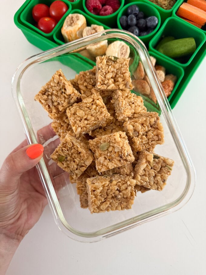 Mini No Bake Granola Bites served in a glass container.