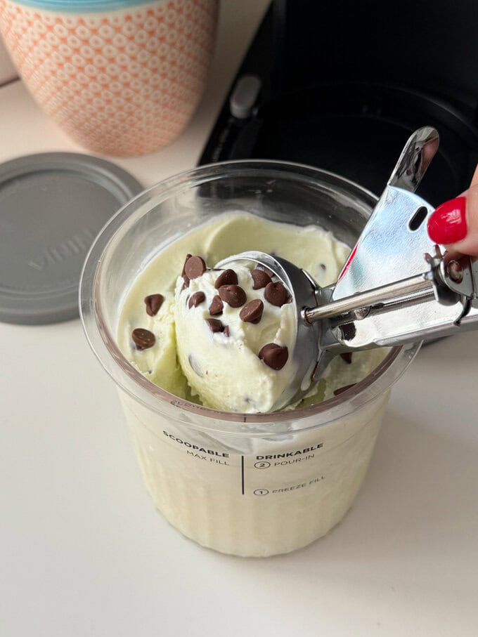 A big ice cream scoop full of Homemade Mint Choc Chip Ice Cream made in the Ninja Creami