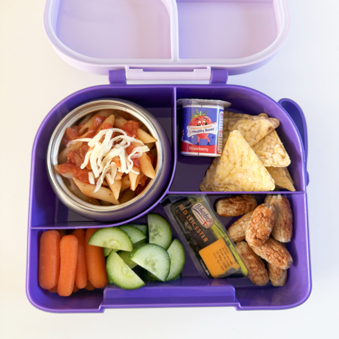 Cheese & Tomato pasta in a purple hot & cold lunch box.