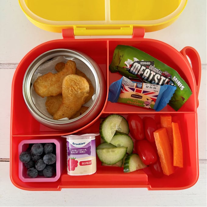 Chicken Nuggets served in a bright yellow Hot & Cold lunch box.